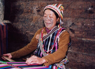 獨龍族紋面女來歷及原因